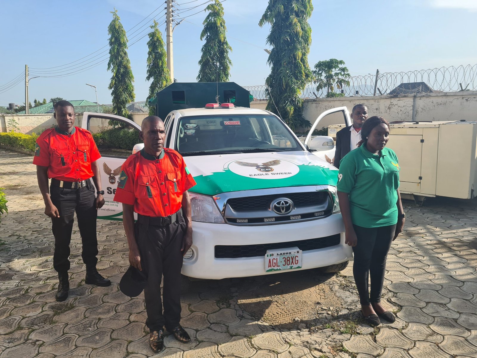 Eagle Sweep operations team with branded vehicle